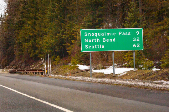 Mileage road sign on Interstate 90.