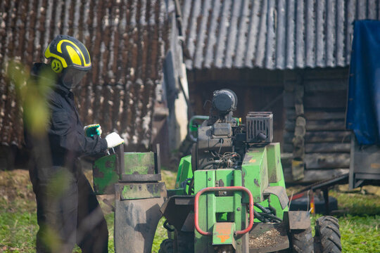 A stump grinder grinds, cuts, and digs up stumps.