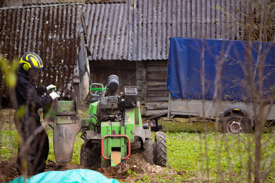 A stump grinder grinds, cuts, and digs up stumps.