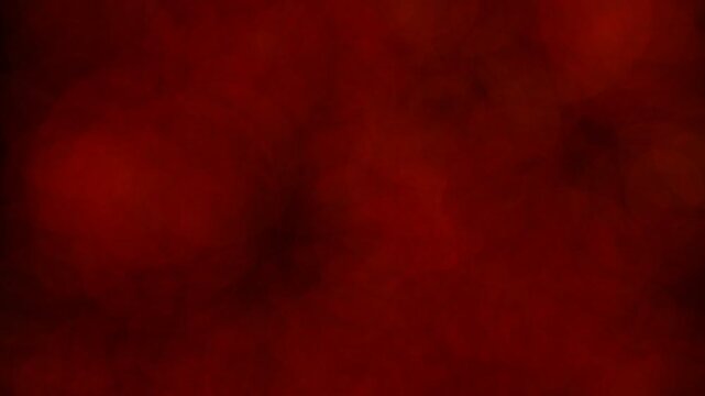 Red Smoke and Mist Slowly Emerging from Dark Background for Horror Suspense and Dramatic Cinematic Texture Backdrop