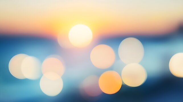 Soft focus sunset over ocean with bokeh lights blur