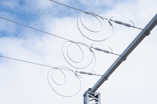Industrial electricity transmission infrastructure featuring metal cables and protective hardware for energy distribution and national power grid management systems