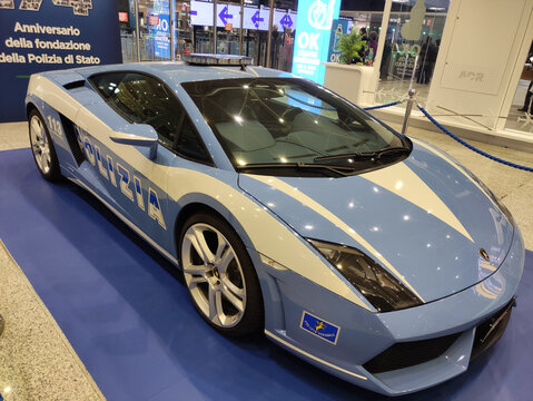 Rome, Italy - April 15, 2026: Italian police Lamborghini Gallardo sports car displayed at an exhibition with blue and white color scheme and police insignia