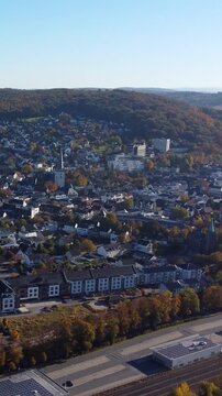 Aerial view flying over menden sauerland in autumn