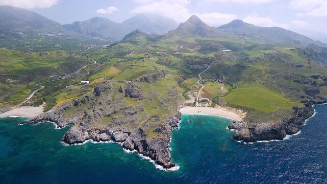 Greece Crete Ammoudi Bay 4K Drone Panning View of Beach and Green Fields Under High Mountains Near Plakias Damnoni and Klisidi Scenic Coastal Nature Travel Destination