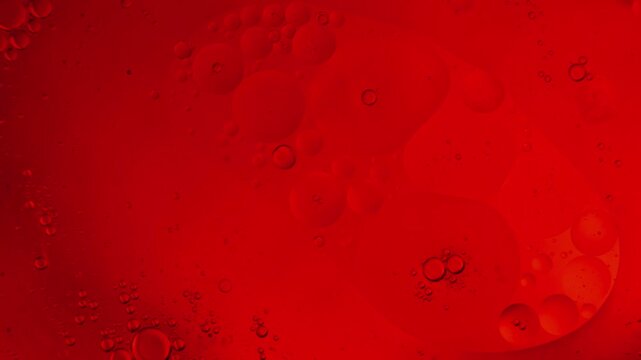 abstract macro liquid background. Oily smooth motions. Analog made background with copy space for display waiting screen or science educational purposes. calm relaxing video.