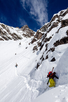 PORTILLO, CHILE &ndash; A skier navigates the steep, narrow Super C couloir at Portillo, one of the most challenging ski runs in the Andes, flanked by towering rock walls.