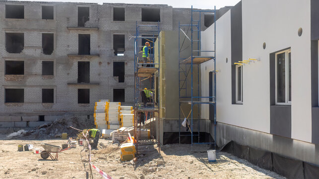 Modern Building Facade Renovation and External Wall Insulation Process