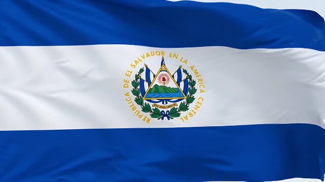 The video shows the national flag of El Salvador waving in the wind. The flag features three horizontal stripes of blue, white, and blue with the national coat of arms prominently displayed in the