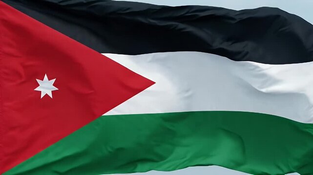 The video displays the flag of Jordan prominently waving against a clear sky. The flag features horizontal black, white, and green stripes with a red triangle on the hoist side, containing a white