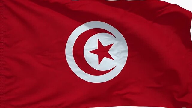 The video showcases the Tunisian national flag waving prominently against a clear sky. The flag features a red field with a white circle at its center, containing a red crescent and star, symbolizing