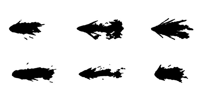 Set of grunge black ink splashes and blots featuring artistic vector silhouettes of birds and butterflies with nature elements like trees in a paint splatter pattern design