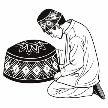 Muslim man kneeling in prayer with traditional hat beside him black and white
