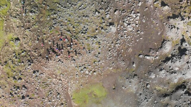 Excursionists in Landmannalaugar, overhead aerial view from drone
