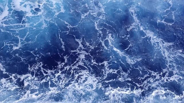 Ocean wave pattern deep blue colors abstract natural background