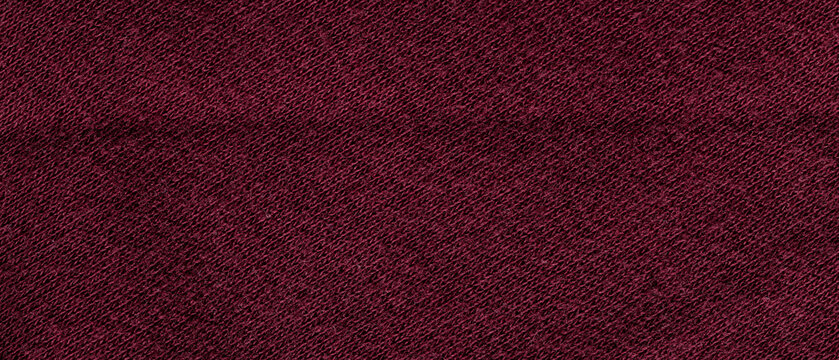 Dark burgundy wine knitted wool fabric texture with diagonal weave pattern