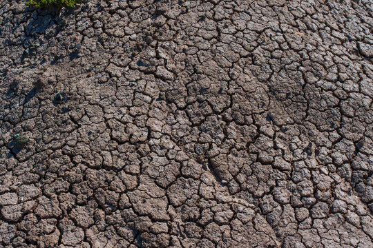Dry Cracked Earth Texture Background Highlighting Drought and Aridity