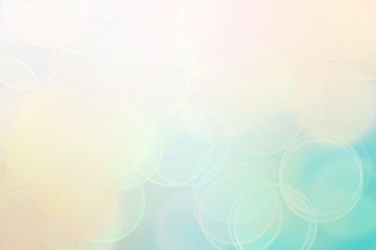 Abstract cream and blue bokeh background.