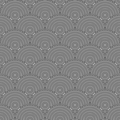 Fish scale wallpaper. Asian traditional ornament with repeated scallops. Repeated black circles and semicircles on white background. Seamless surface pattern design with rings. Vinyl motif. Vector. © funkyplayer