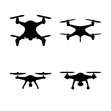 Four different drone designs in black silhouette - Modern black drone icons in various styles and angles for design projects or tech presentations.