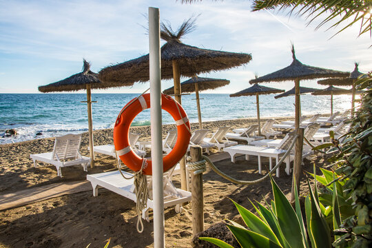 beach chairs and umbrellas