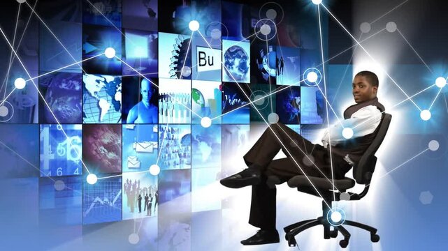 Executive sitting in chair while tech network moving across tiled wall, nodes causing recline