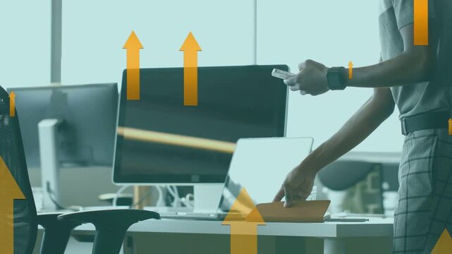 Man tapping phone, lifting tablet, placing tablet before business laptop while orange arrows moving