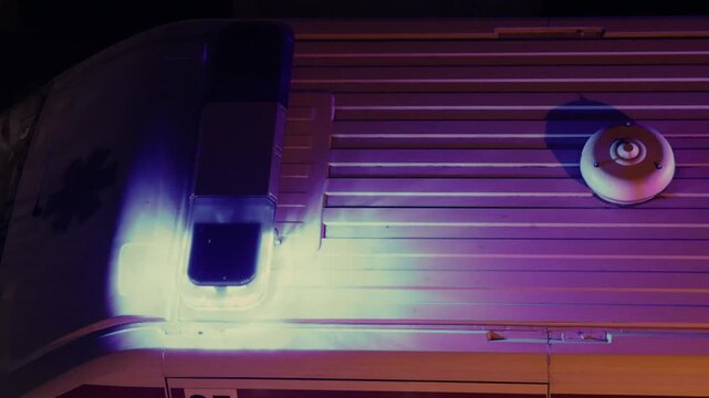 Top View Flashing Blue Lights Emergency Vehicle EMS Van at Night