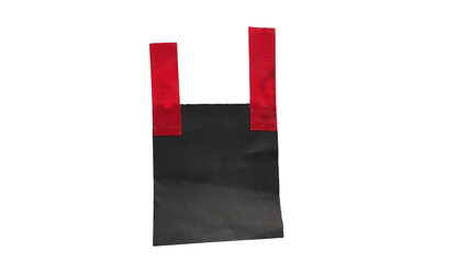 Black shopping bag with red handles standing upright isolated on transparent background © MDJAHIDHASAN