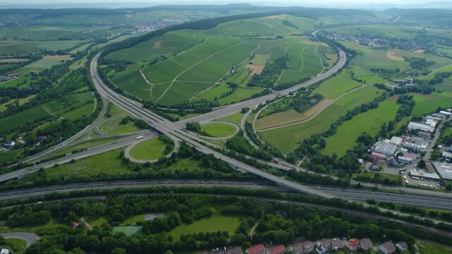 Aerial view of the freeway crossing beside the city Weinsberg in Germany on a sunny day in spring
