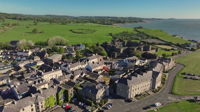 Aerial Video Beaumaris Wales.Beaumaris is a town and community on the Isle of Anglesey in Wales, of which it is the former county town. It is located at the eastern entrance to the Menai Strait.