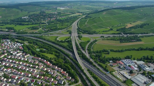 Aerial view of the freeway crossing beside the city Weinsberg in Germany on a sunny day in spring