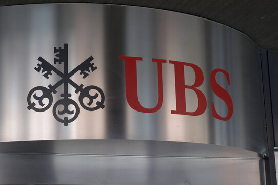 UBS Bank logo sign on building entrance in Lugano, Switzerland