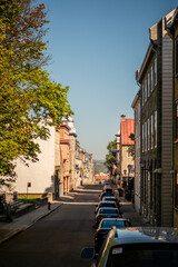 Fototapeta premium Old Quebec City Streets with Historic Buildings Cobblestone Roads and European Style Architecture