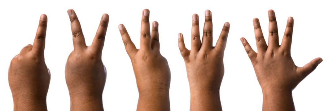 Little child counting using fingers against white background, closeup. Set of hand gestures