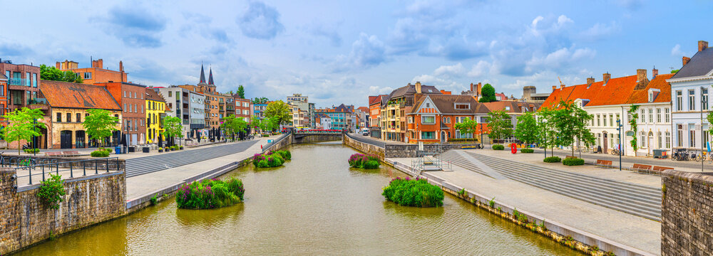 Kortrijk cityscape panoramic view with embankment promenade of Lys river, Courtrai panorama with buildings in historical centre, belgium landmark, West Flanders province, Flemish Region, Belgium
