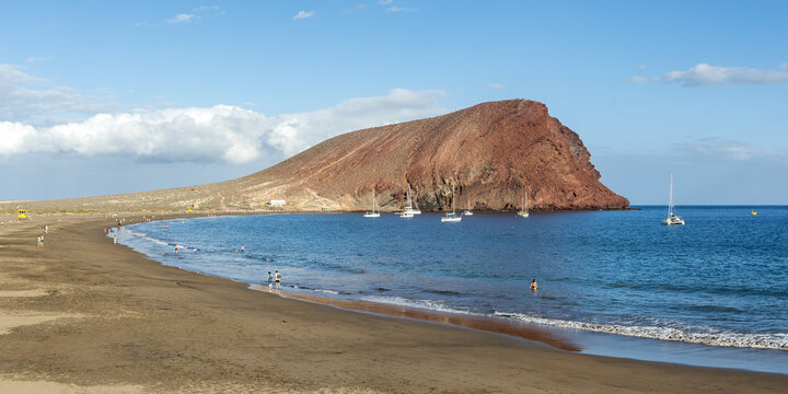 Playa de la Tejita beach with Montana Roja mountain sea vacation panorama on Tenerife island in Spain