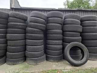 Obraz premium Car tires near a tire shop, car service station