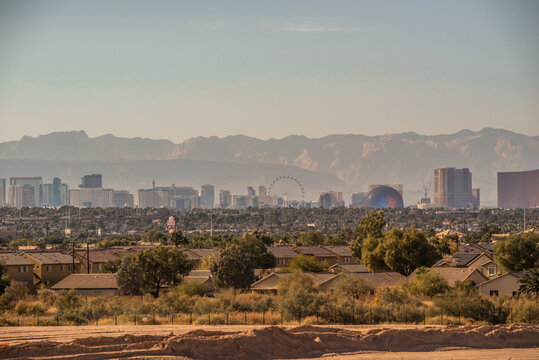  Las Vegas Nevada Skyline with Stratosphere Tower and Desert Mountain Backdrop from Daylight to Sunset and Night