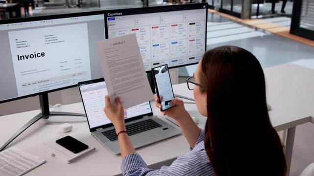 Office Manager Scanning Document With Smartphone