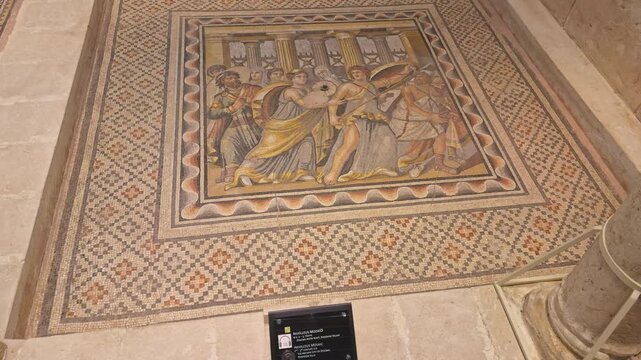 High-quality 4K cinematic footage of the ancient Roman Achilles (Akhilleus) mosaic in Zeugma. A masterpiece depicting the hero among Lycomedes' daughters at the world-famous museum in Turkey.