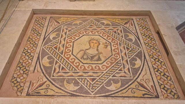 Breathtaking 4K cinematic footage of the Gaia Mother Earth mosaic. Features the central goddess figure within a complex geometric frame at the Zeugma Museum in Turkey.