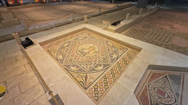 Breathtaking 4K cinematic footage of the Gaia Mother Earth mosaic. Features the central goddess figure within a complex geometric frame at the Zeugma Museum in Turkey.