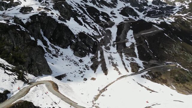 Cinematic drone flight above snowy alpine peaks near Lac Blanc in Chamonix, France, captured in slow motion