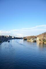 Fototapeta premium Po River Landscape with Blue Sky in Turin Italy