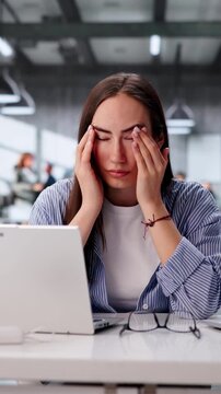 Office Manager Having Eye Strain From Prolonged Use