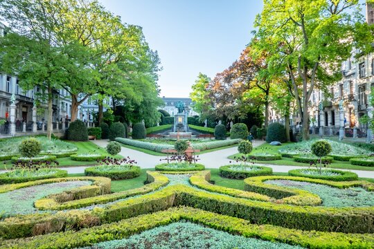  Formal Urban Garden with Symmetrical Landscaping and Historic Architecture in Brussels Belgium During Spring Season