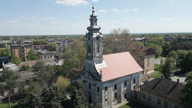 Aerial shot flying towards the Reformed Calvinist Church in Vrbas, Serbia.