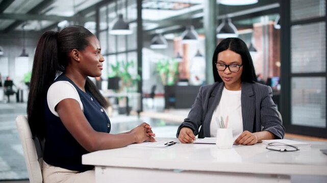 Professionals Discussing Job Opportunities During Office Interview