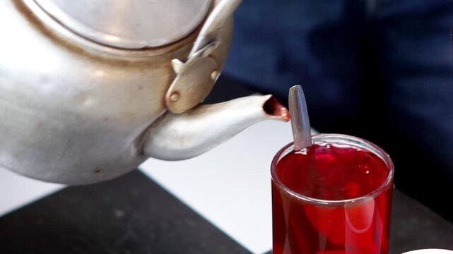 Wedang secang, herbal drink made from tree bark of secang (sepang, Biancaea sappan, sappanwood and Indian redwood).